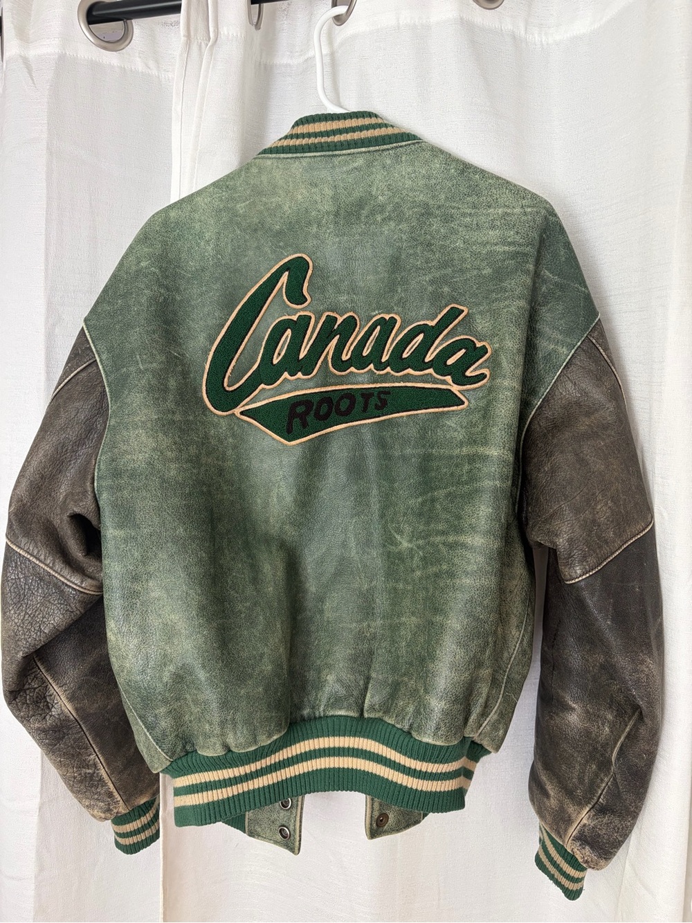 Roots Green Varsity Jacket with Brown Leather Sleeves